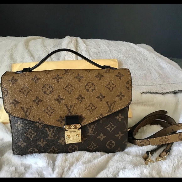 Handbags - Pochette Métis